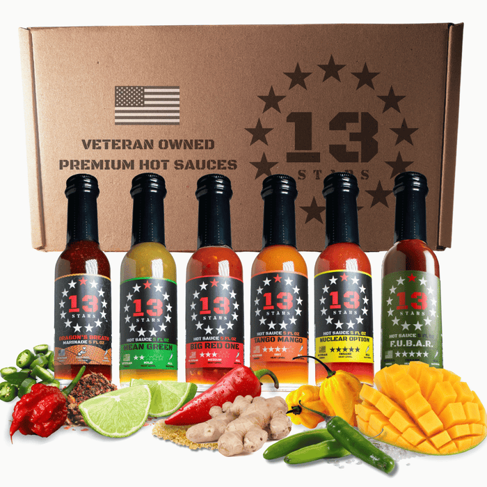 Six hot sauce bottles displayed with a 13 Stars gift box and peppers