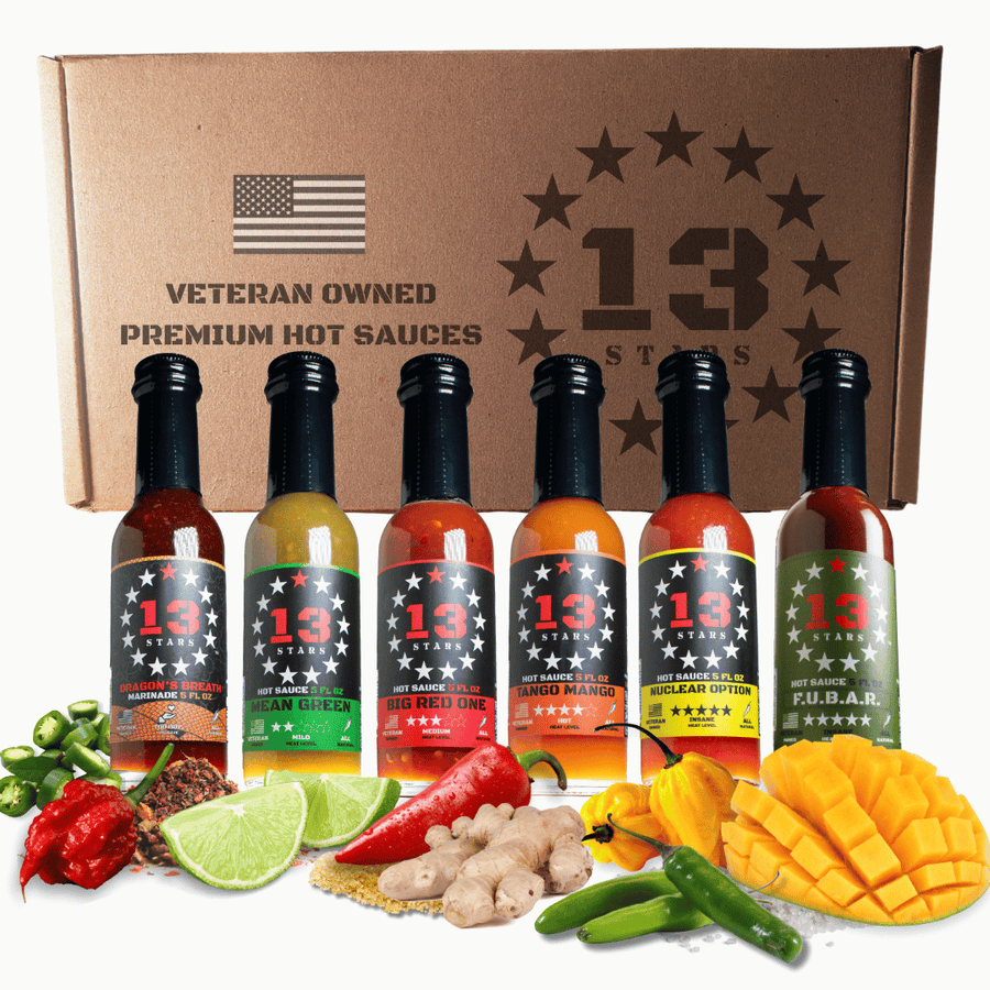 Six hot sauce bottles displayed with a 13 Stars gift box and peppers