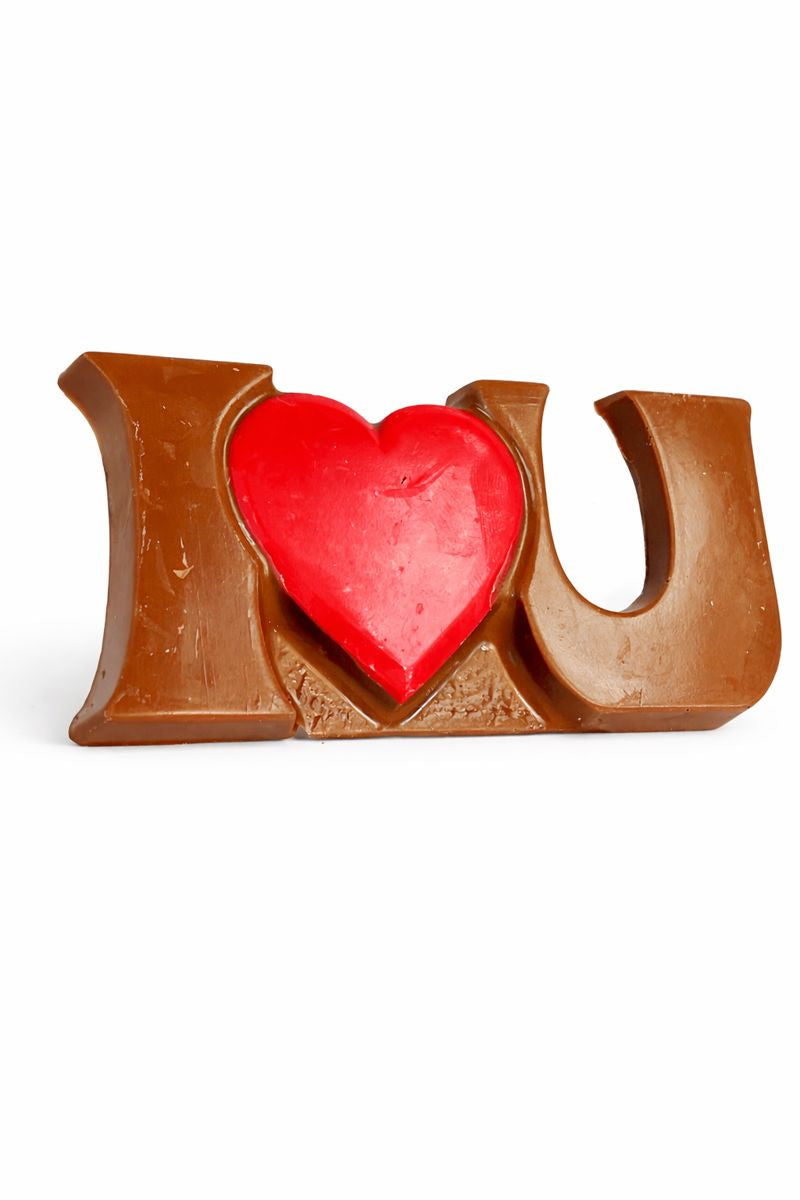 I Love You chocolate design with brown I and U shapes around a bright red heart