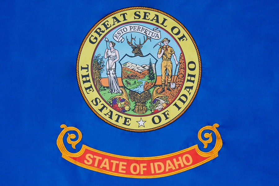 Idaho state flag close-up with Great Seal and State of Idaho banner