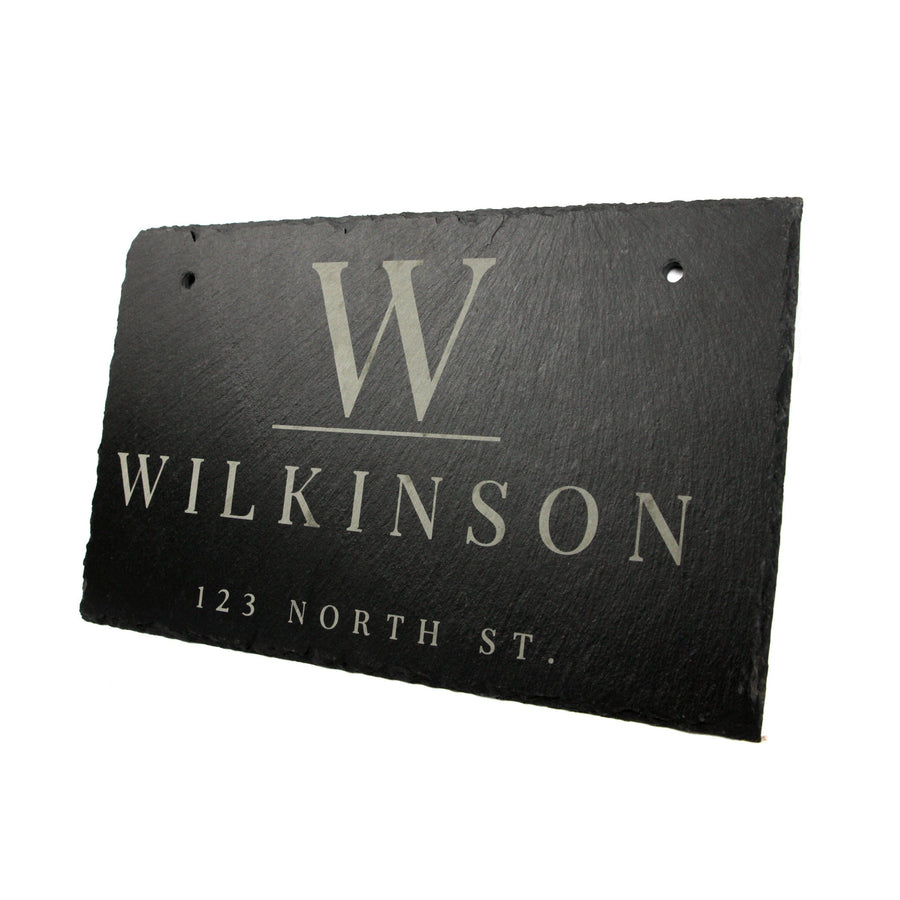 Angled view of a personalized slate address sign with two hanging holes