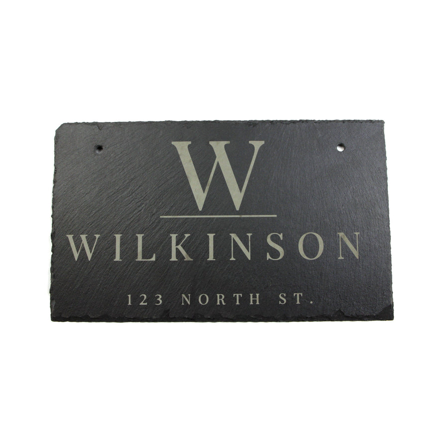 Rectangular slate sign engraved with an example initial, surname and address
