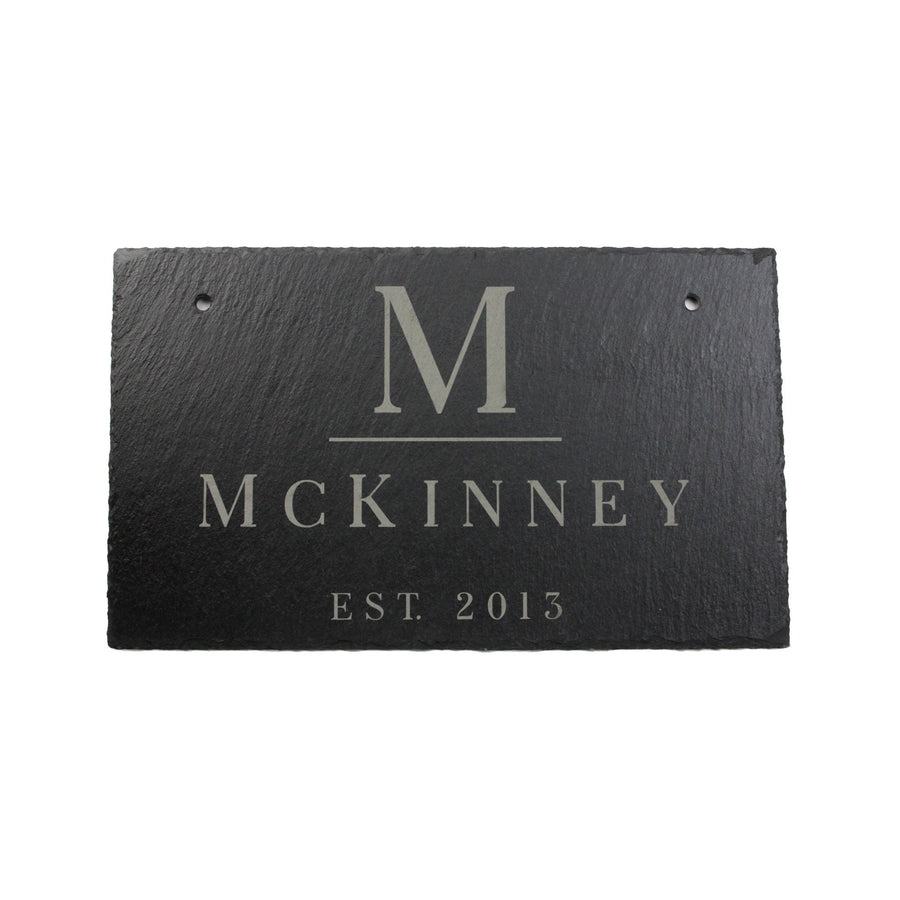 Slate name sign showing an example monogram, surname and established date