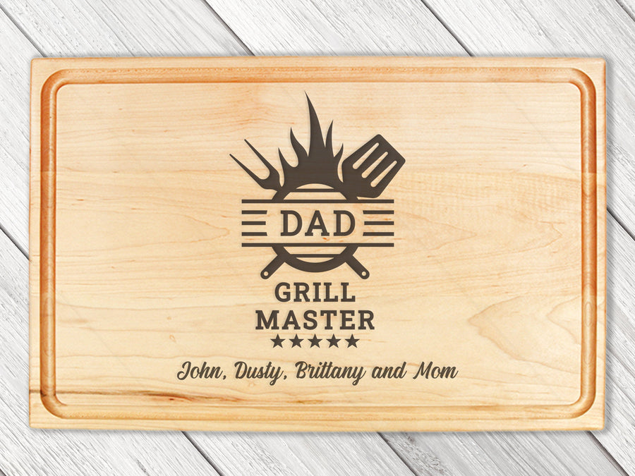 Maple cutting board showing a Dad Grill Master engraving