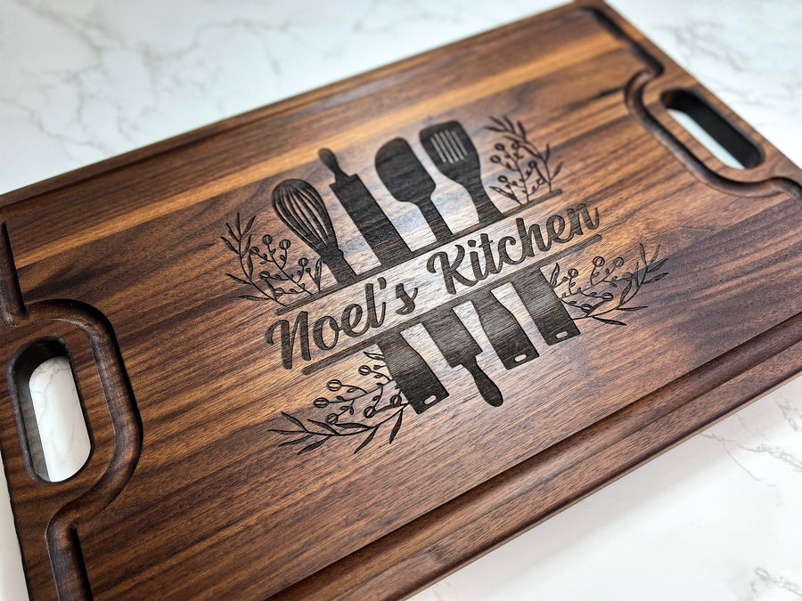 Walnut serving board engraved with a Mom's Kitchen design