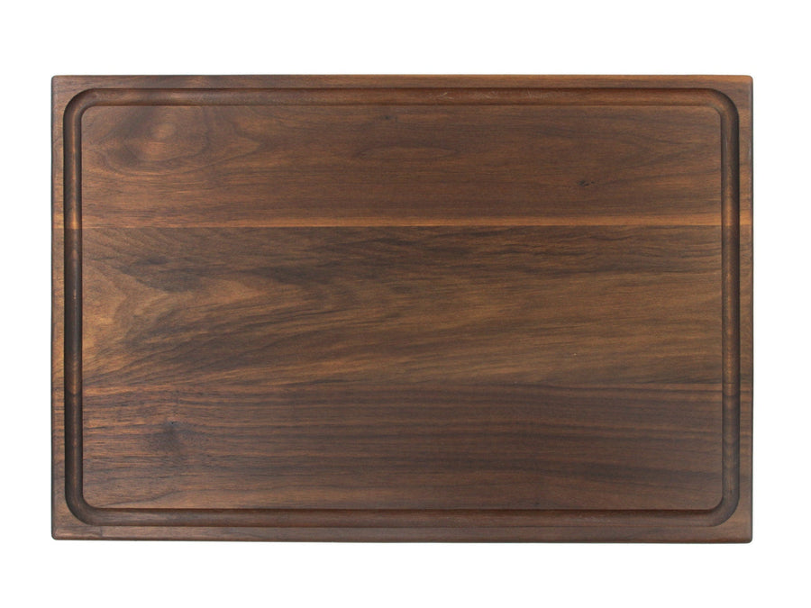 Walnut cutting board with a simple rectangular juice groove