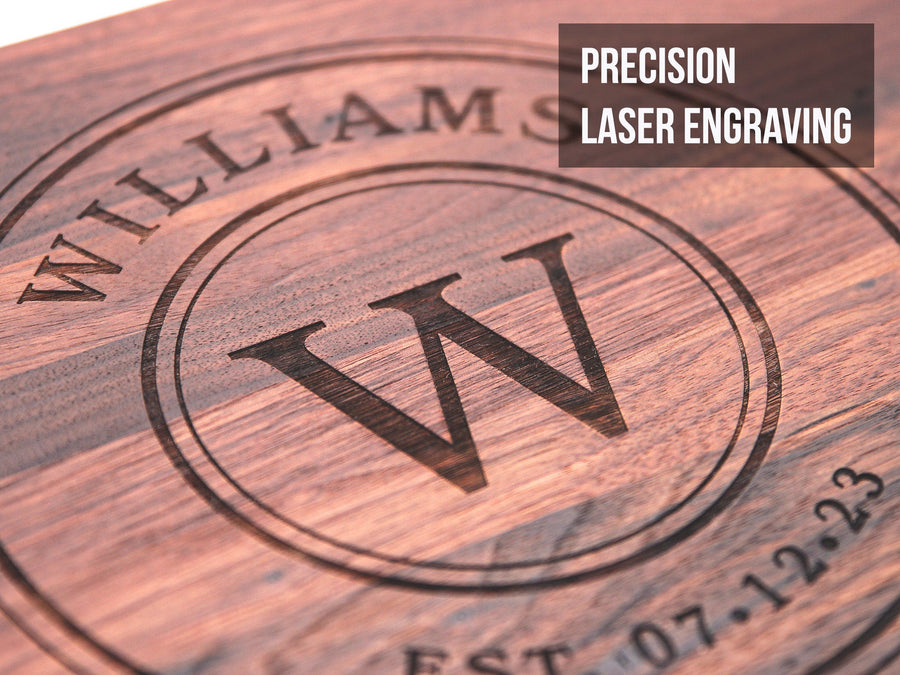 Close view of a circular family monogram engraving in walnut
