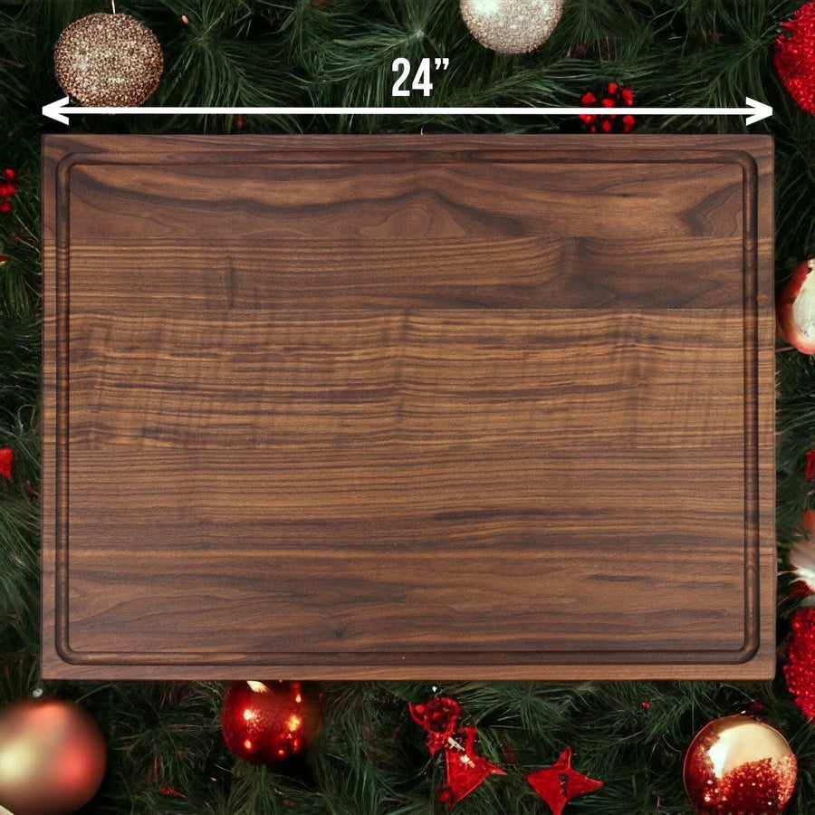 Large walnut board with a 24-inch width arrow and decorative greenery