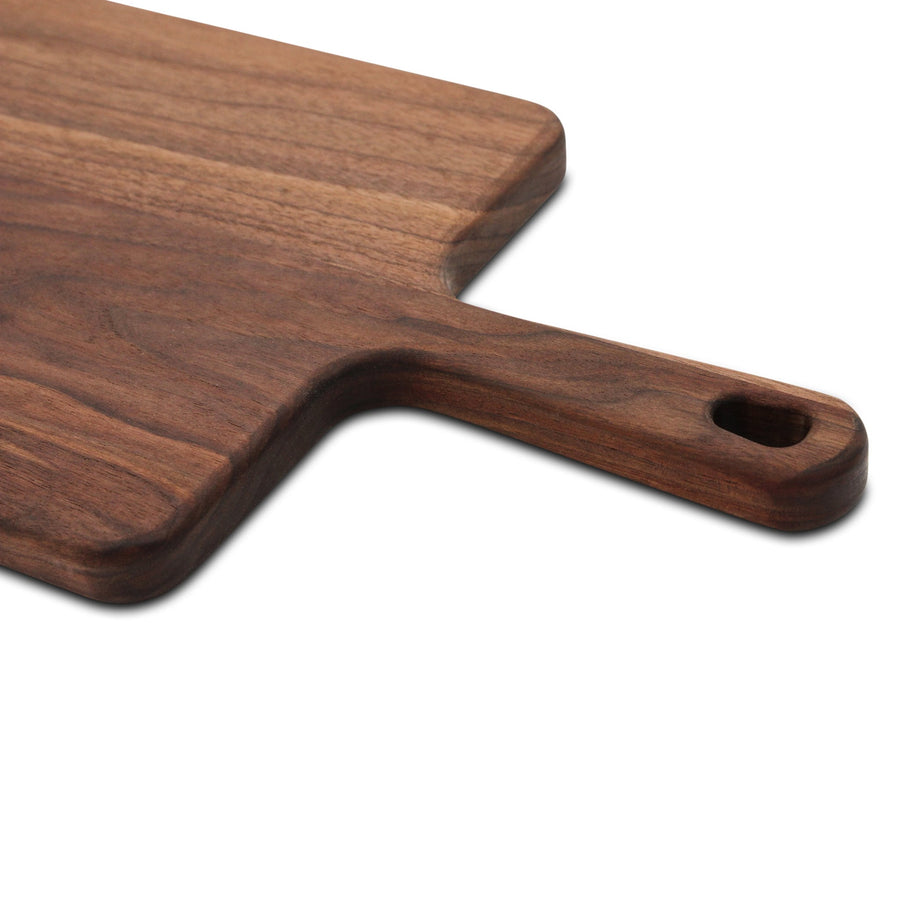 Close view of the walnut paddle handle and round hanging hole