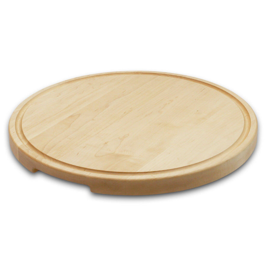 Thick round maple cutting board with a perimeter groove