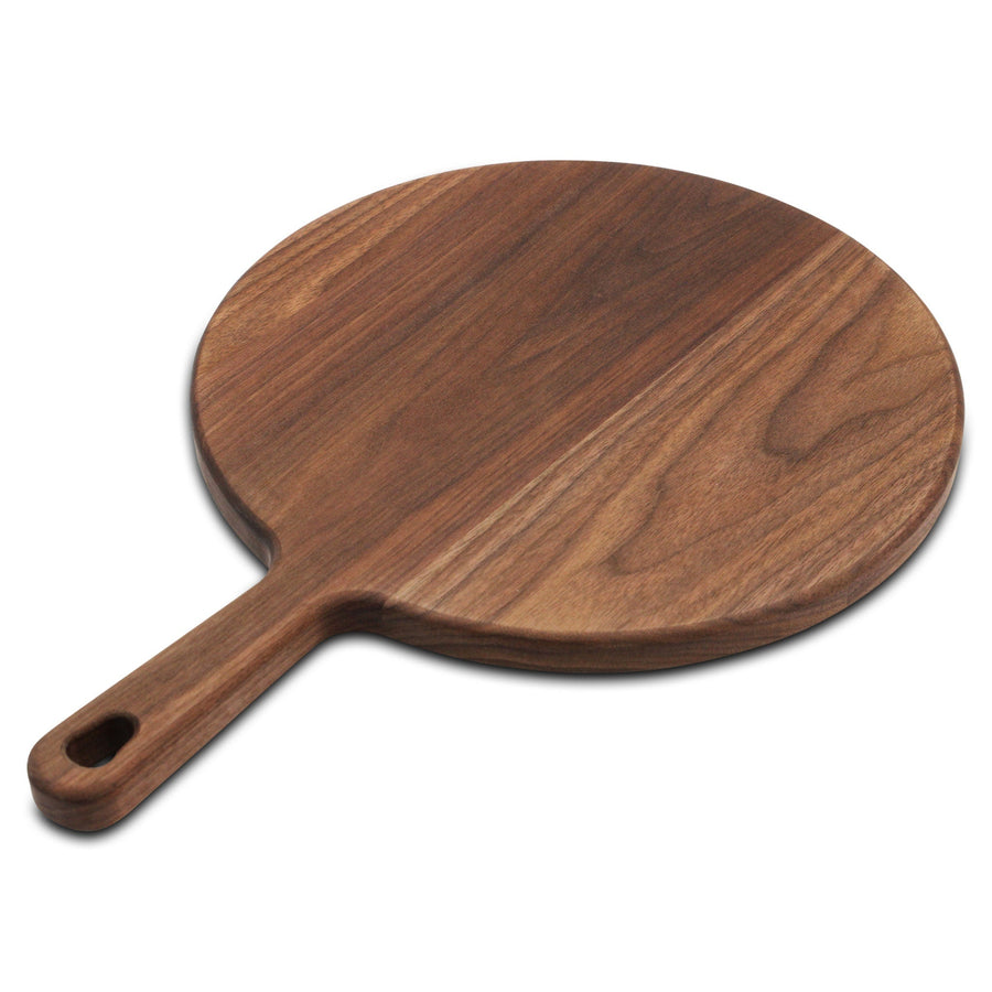 Walnut round serving paddle showing the broad surface and built-in handle