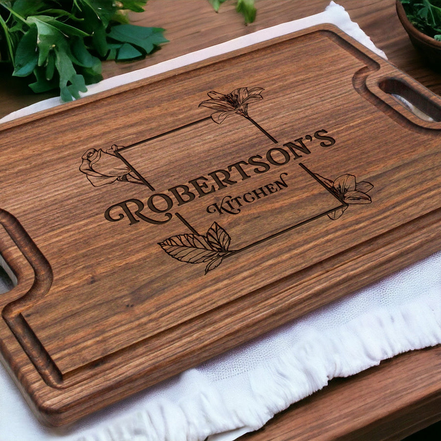 Walnut board engraved with a family kitchen-name design