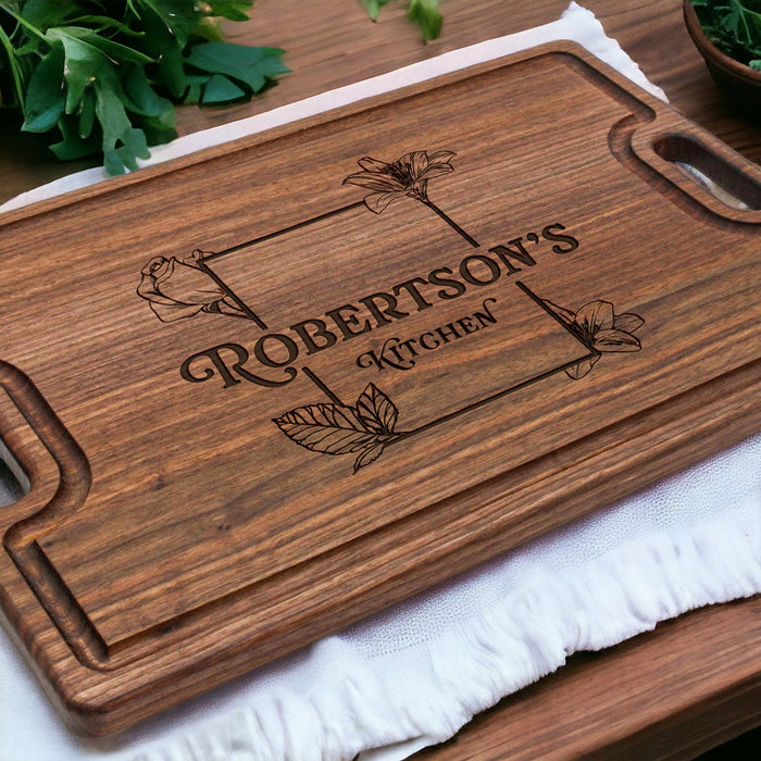 Walnut board engraved with an example family kitchen design