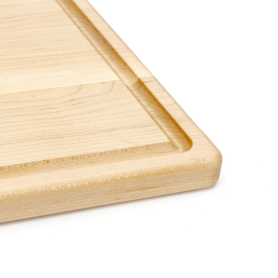 Maple board detail showing the perimeter juice groove