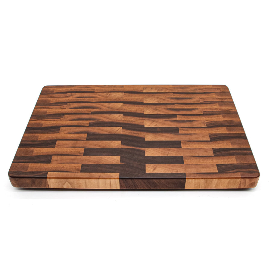 Calico walnut end-grain butcher block with contrasting light and dark blocks