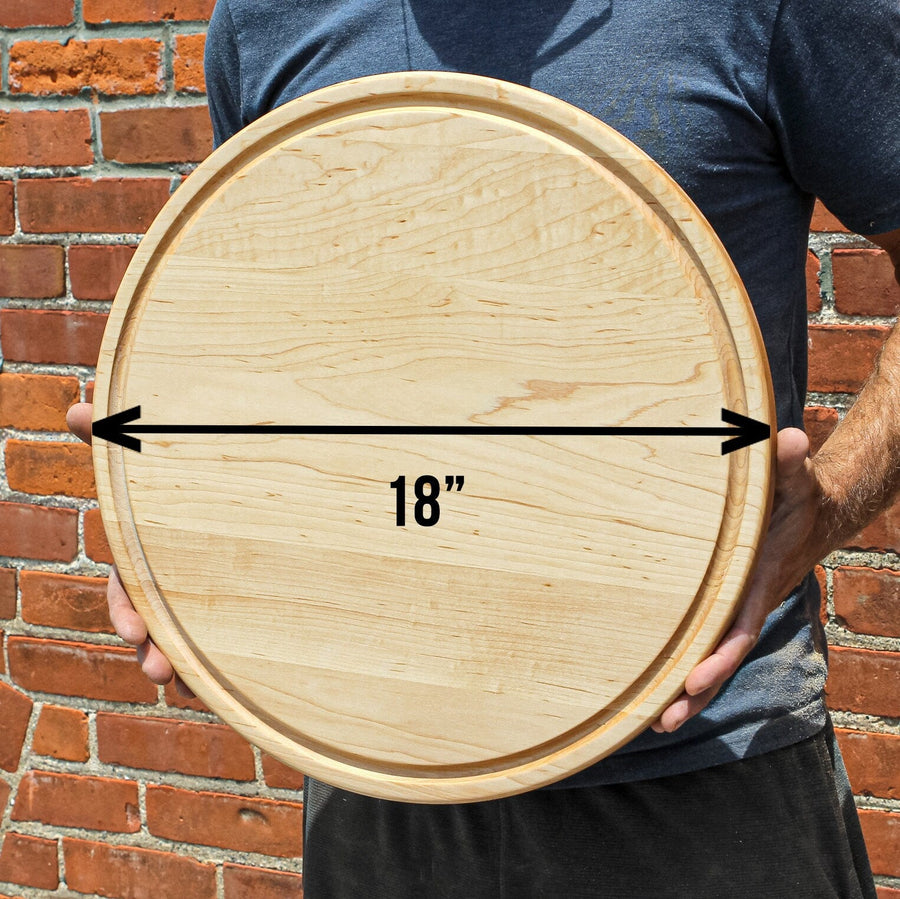 Round maple cutting board with an 18-inch diameter arrow