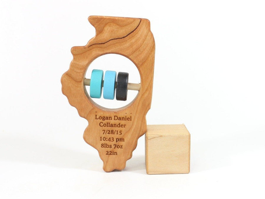 Illinois cherry wood rattle with an example of engraved personalization