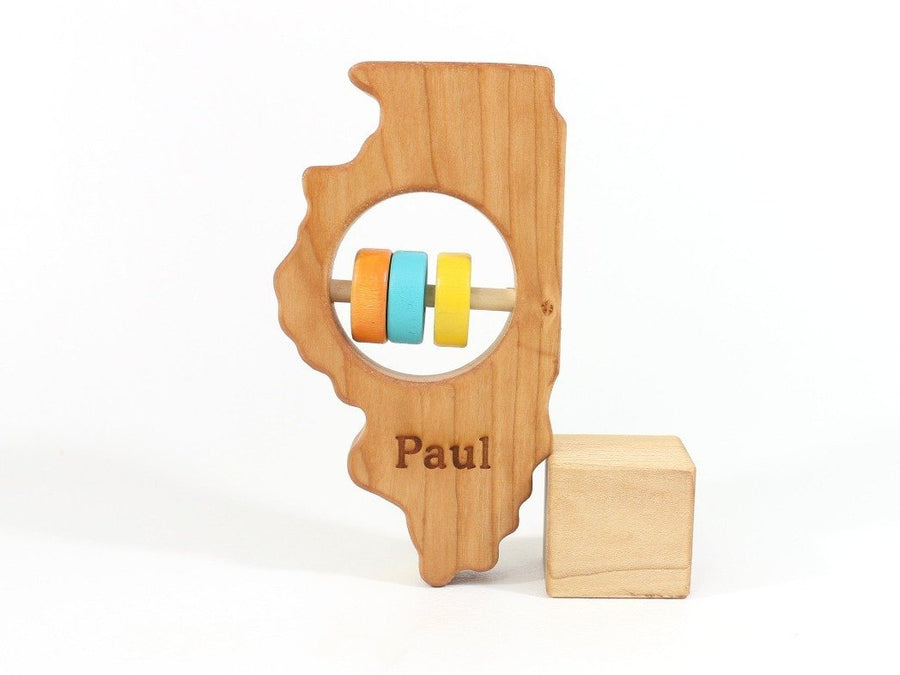 Illinois cherry wood rattle with an example of engraved personalization