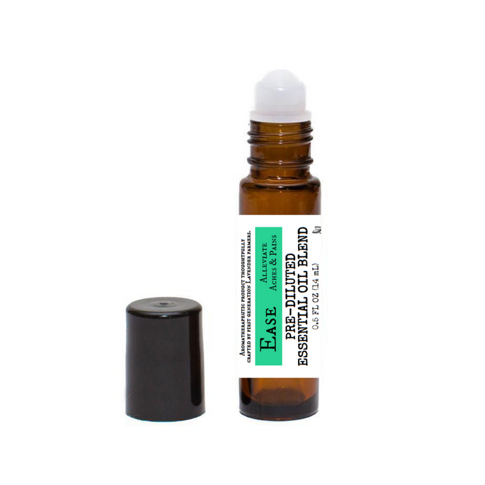 Pre-diluted EASE Lavender Essential Oil Blend — amber roll-on bottle with cap removed