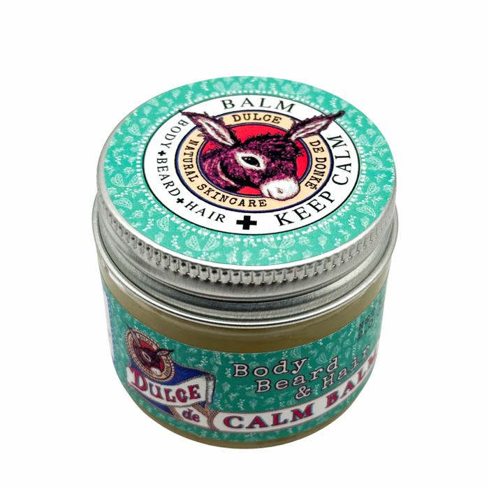 Closed Calm Balm jar with a green label and silver lid