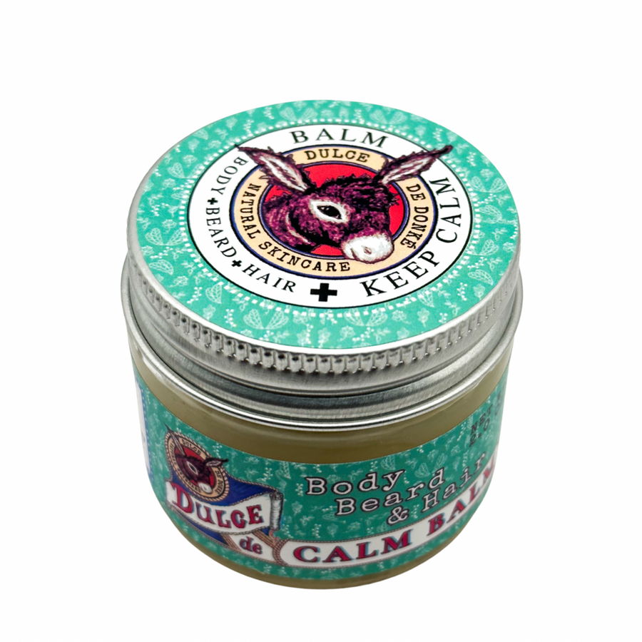 Calm Balm jar viewed from above with its donkey-logo lid