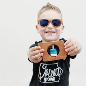 Iowa cherry wood rattle in a lifestyle setting