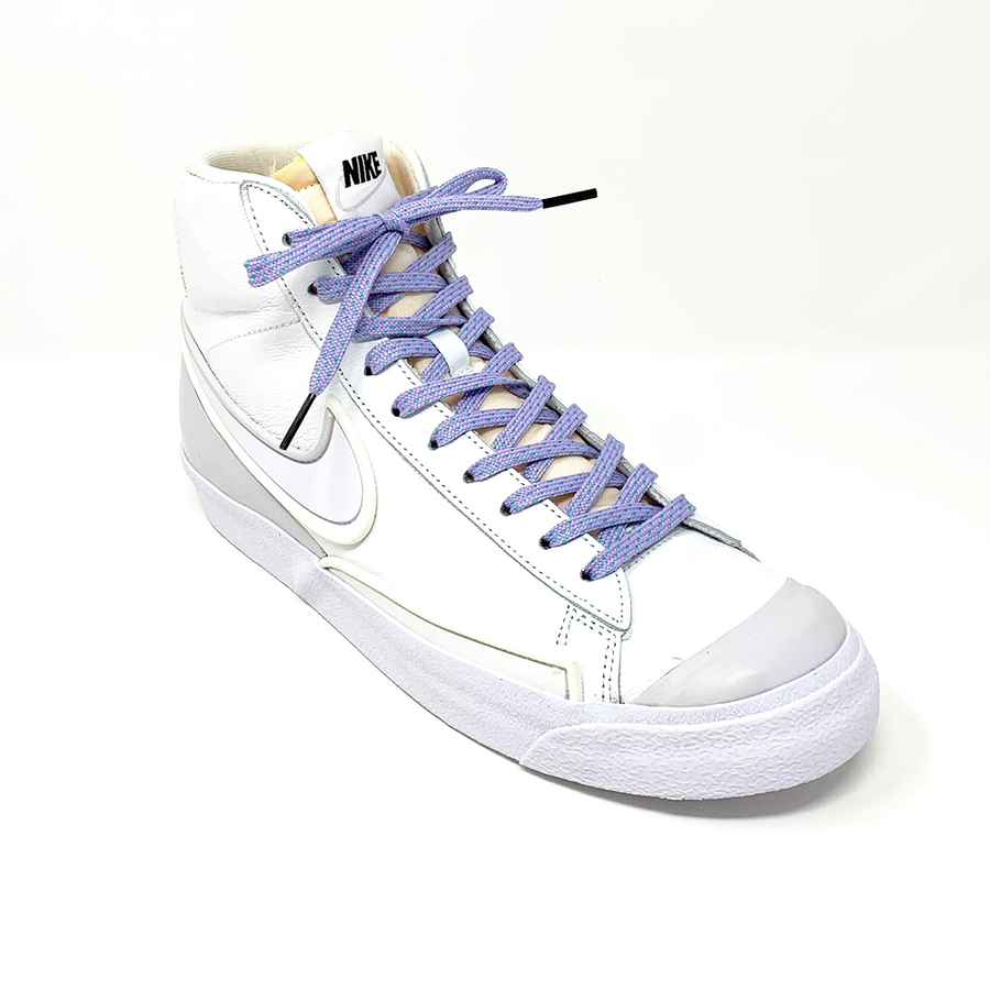 Lavender & Electric Green ticked flat shoelaces laced into a white high-top sneaker