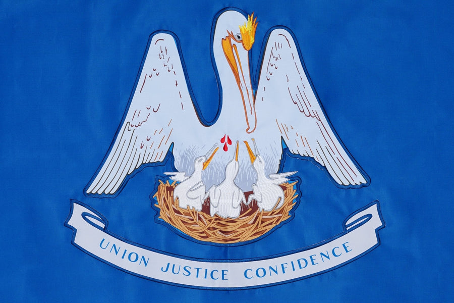 Louisiana state flag close-up with pelican and Union Justice Confidence motto