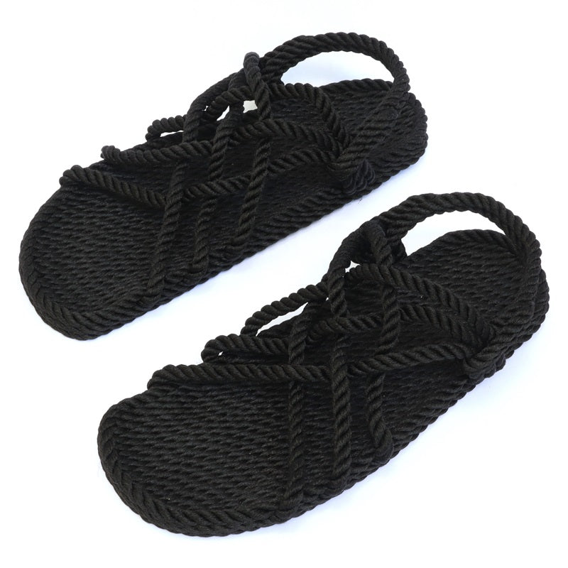 Pair of black Utopian rope sandals with woven soles and crisscross straps