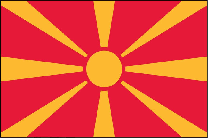 North Macedonia flag made in USA with red field yellow sun and eight rays