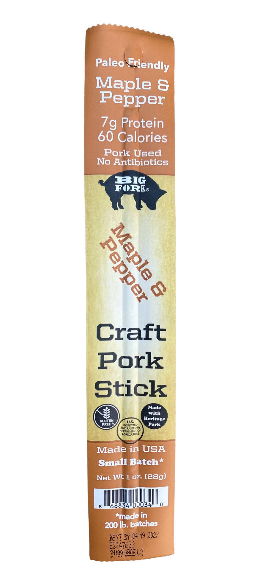 Maple & Pepper pork stick in its brown and cream wrapper