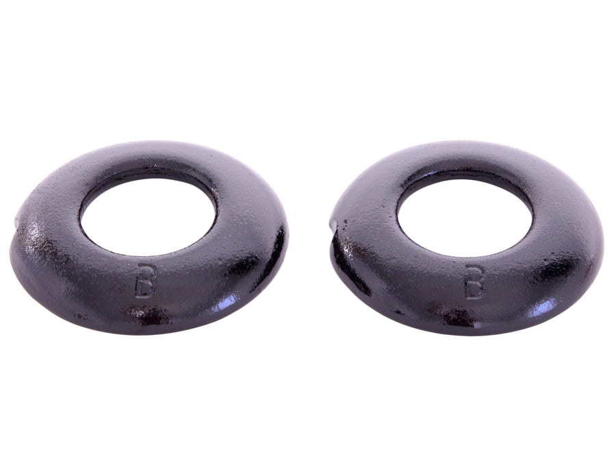 Two black cast-steel quoits shown close up