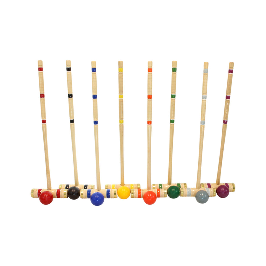 Croquet mallets and balls arranged with the set’s storage equipment