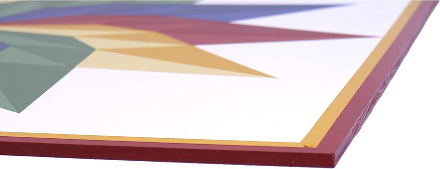 Close-up of hand-painted barn quilt edges and geometric color details