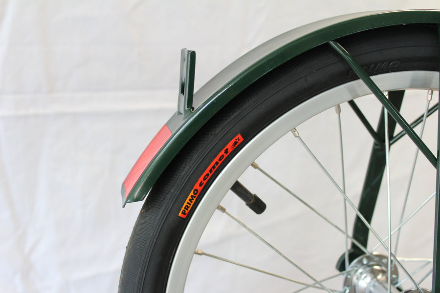 Close-up of a scooter wheel and fender