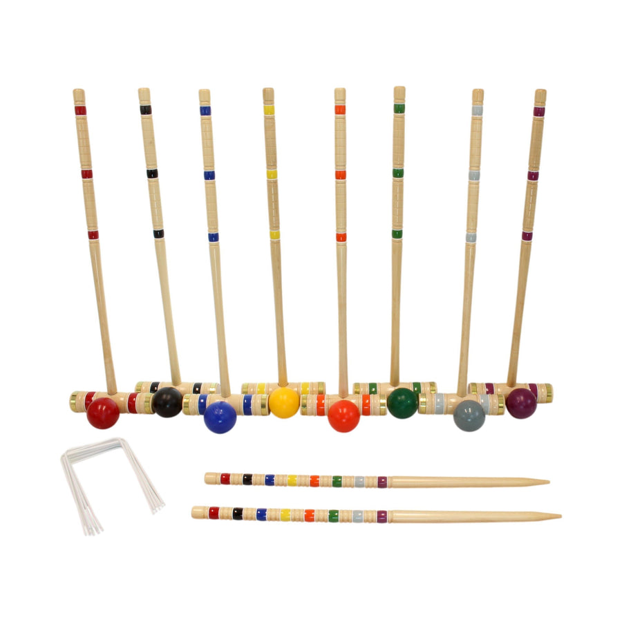 Croquet mallets and balls arranged with the set’s storage equipment