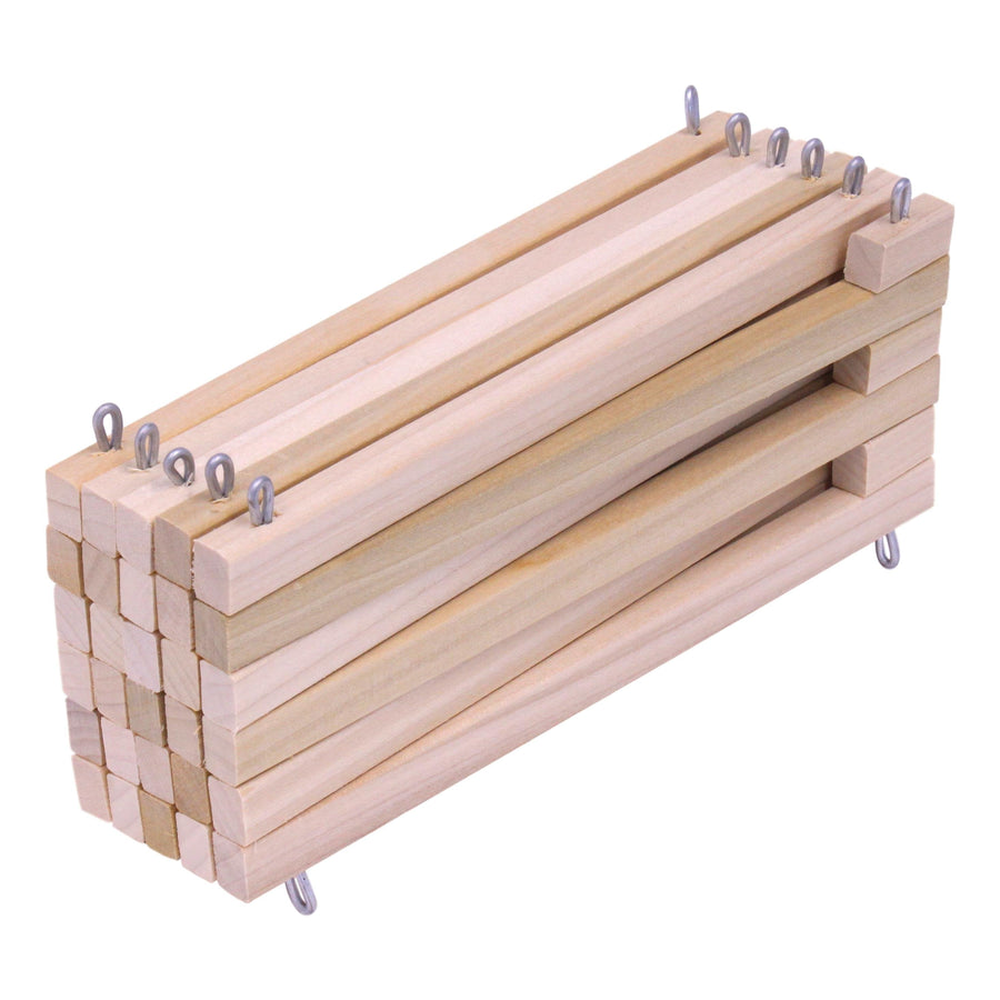 Wooden toy fence folded into a compact stack