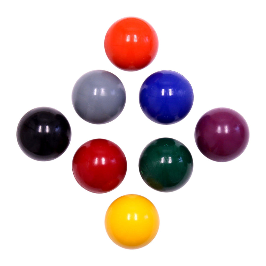 Colored croquet balls arranged for comparison