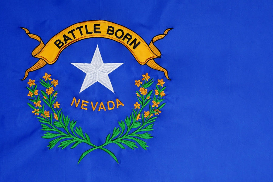 Nevada state flag close-up with Battle Born banner and Nevada emblem