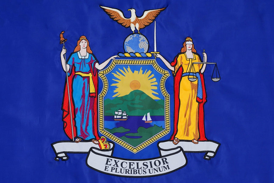 New York state flag close-up with Liberty Justice eagle and Excelsior motto