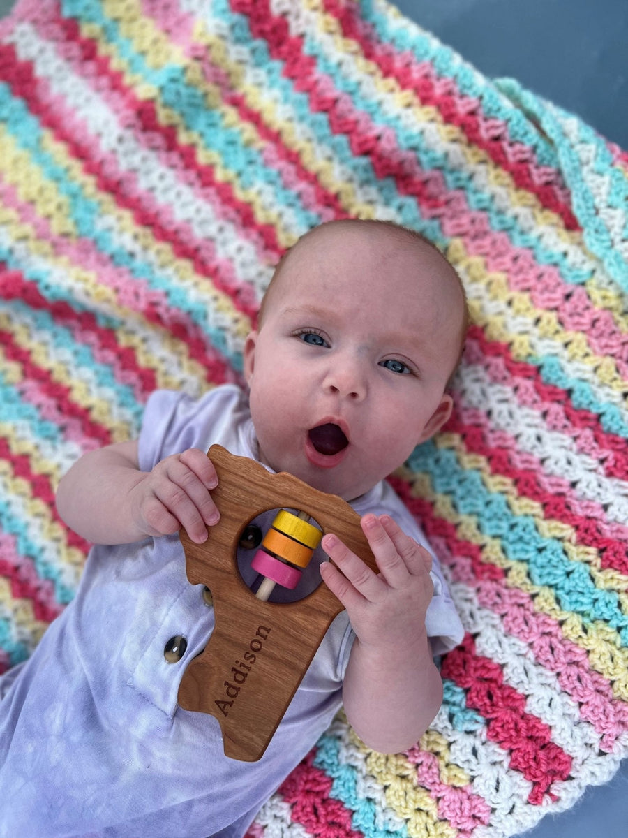 New York cherry wood rattle in a lifestyle setting