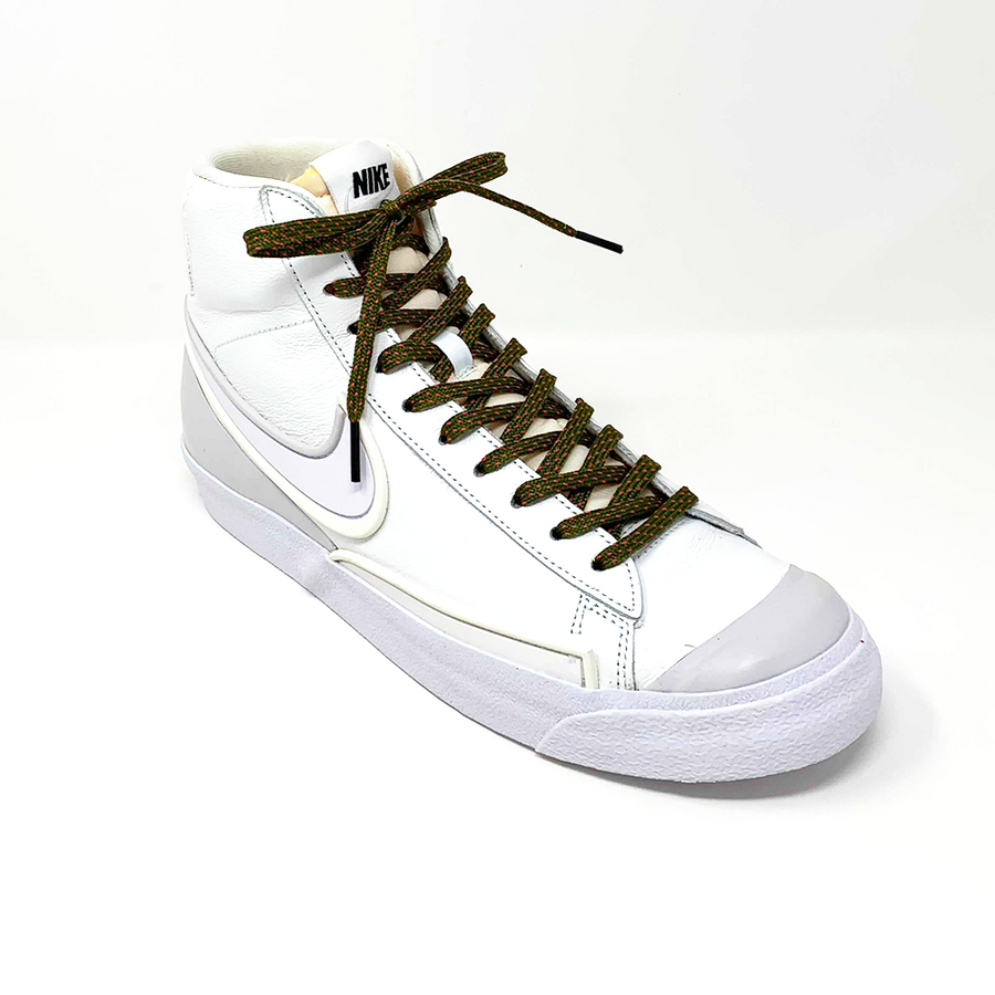 Olive Green & Guava ticked flat shoelaces laced into a white high-top sneaker