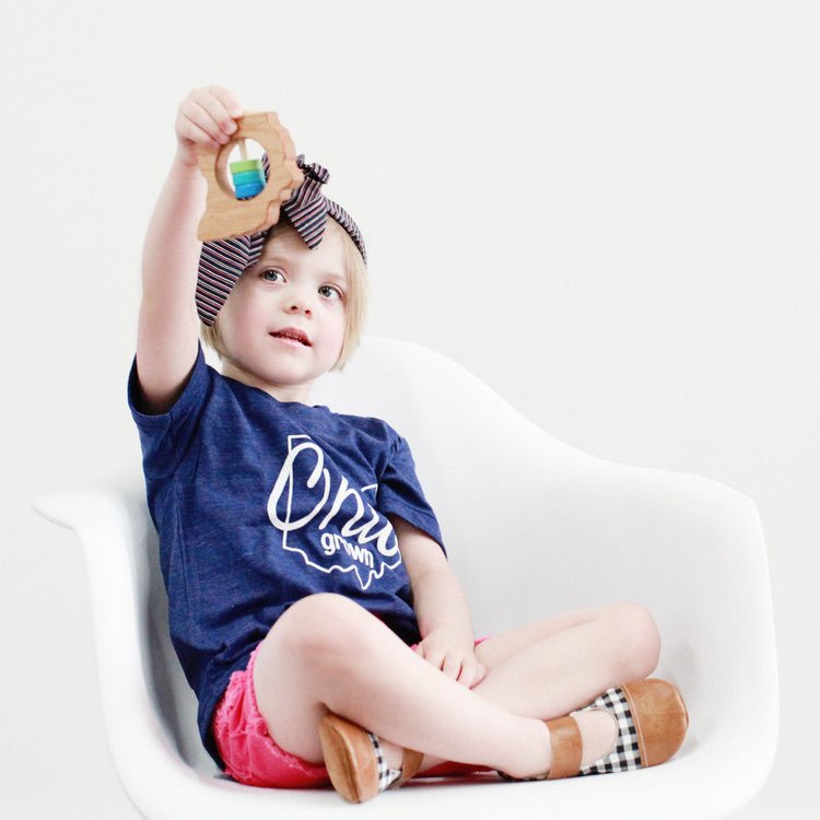Ohio cherry wood rattle in a lifestyle setting