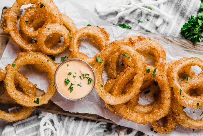 Onion rings with a creamy Texas Ranch-style dipping sauce
