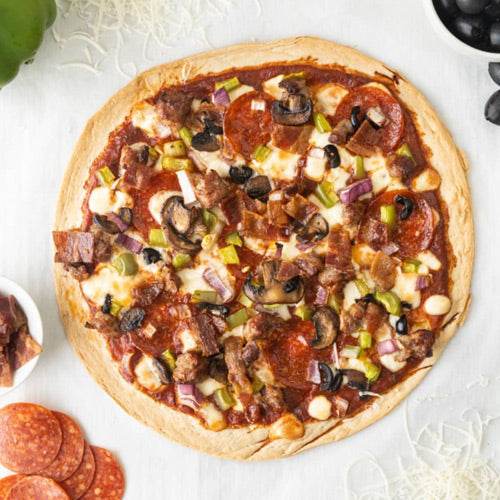 Low Carb Thin Pizza Crusts: topped pizza serving idea.