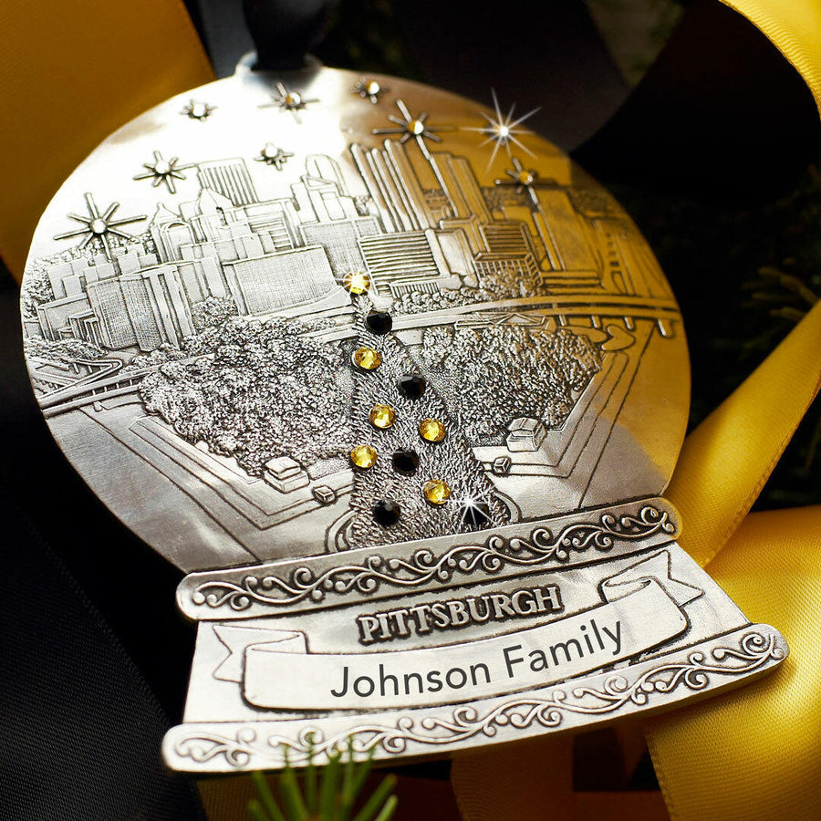 Styled display featuring Pittsburgh Snow Globe Ornament