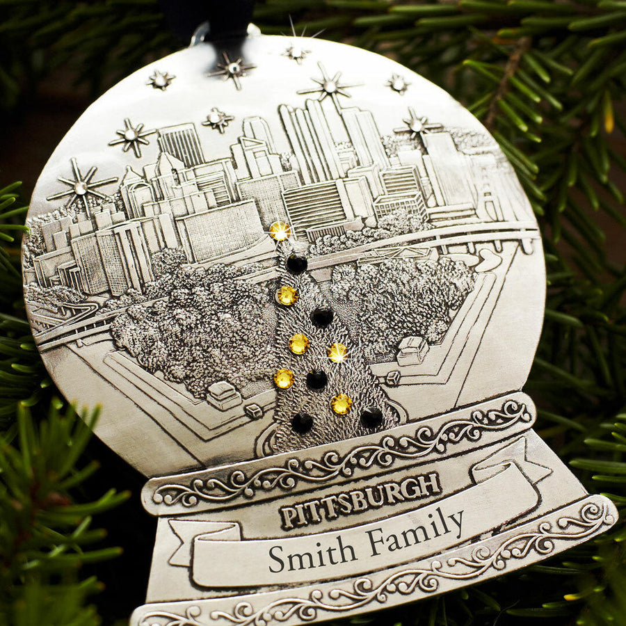 Styled display featuring Pittsburgh Snow Globe Ornament