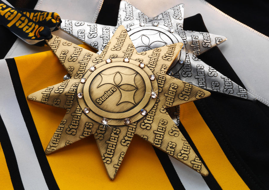 Collection display featuring Pittsburgh Steelers Solstice Star Collector's Ornament