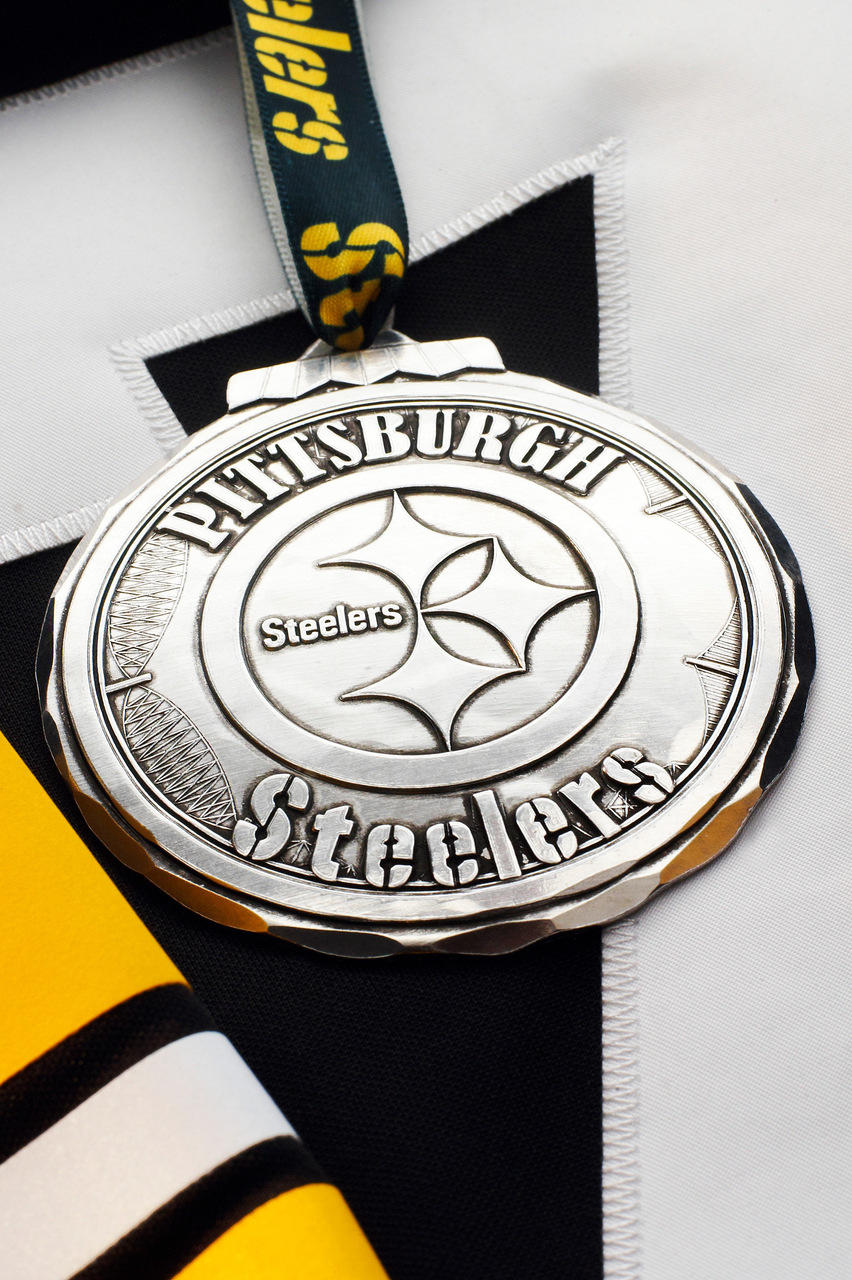 Styled display featuring Pittsburgh Steelers Classic Round Ornament
