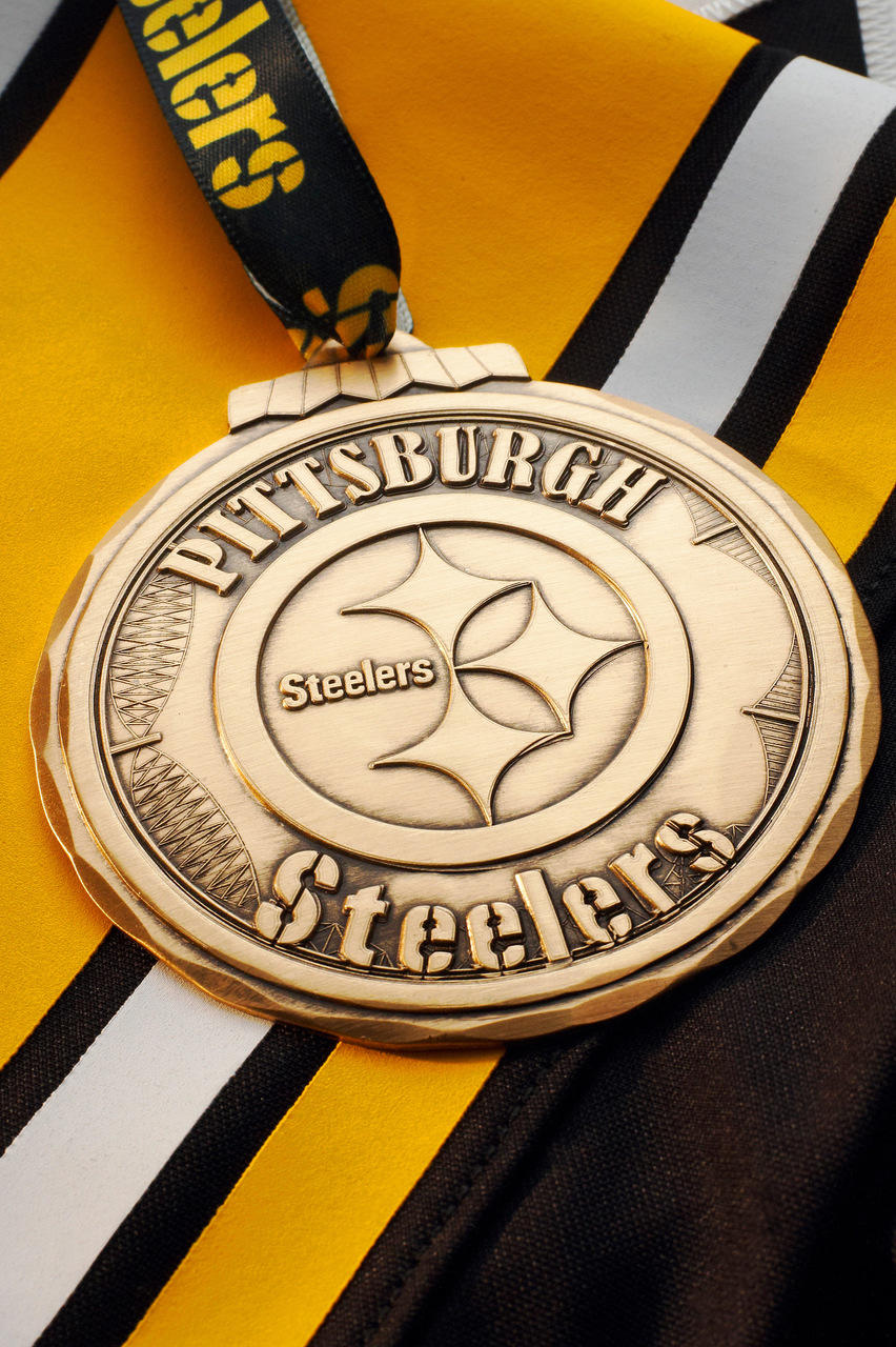 Styled display featuring Pittsburgh Steelers Classic Round Ornament
